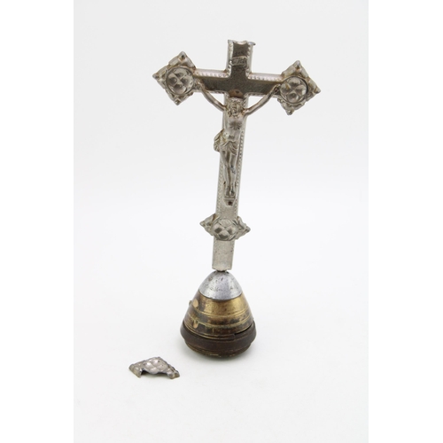 229 - Trench art model of a crucifix, marked INRI, mounted to top of a shell nose, damaged, 29cm tall.