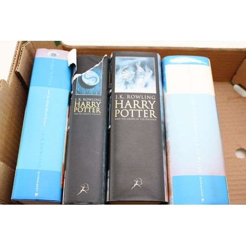 233 - A collection of Harry Potter books to include Harry Potter and the Half-Blood Prince, Harry Potter a... 