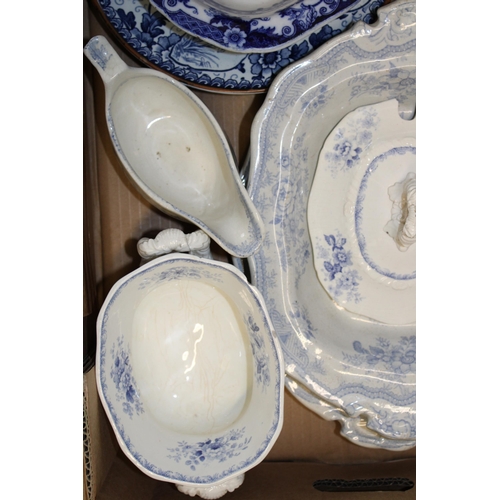 234 - A mixed collection of blue and white ceramic items to include 19th century tureen, Cauldon dish and ... 