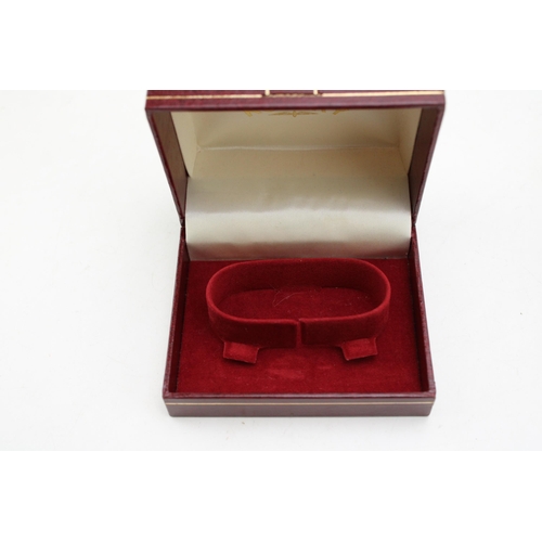 243 - An original vintage gentleman's Rotary watch box in red leather. Height 5cm.