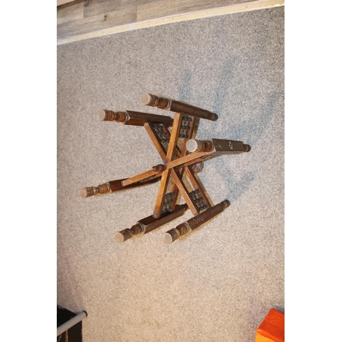 244 - A vintage middle eastern copper and brass topped occasional table with hand carved collapsible base.... 