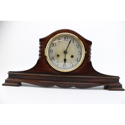 248 - A Napoleon Hat clock, silver tone dial with Arabic numerals, brass bezel, chiming movement, pendulum... 