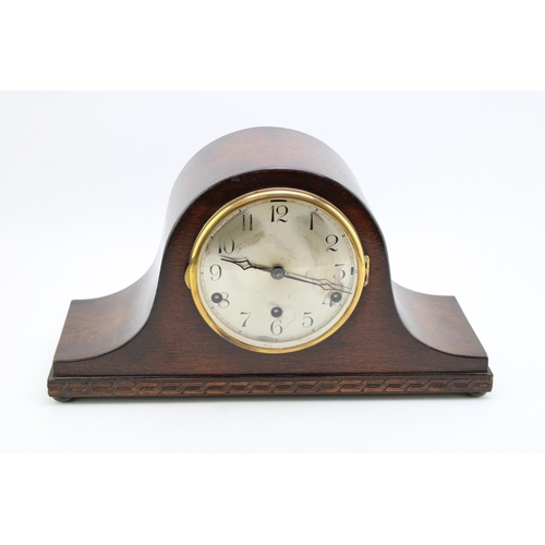 249 - A Napoleon Hat clock, silver tone dial with Arabic numerals, brass bezel, chiming movement, pendulum... 