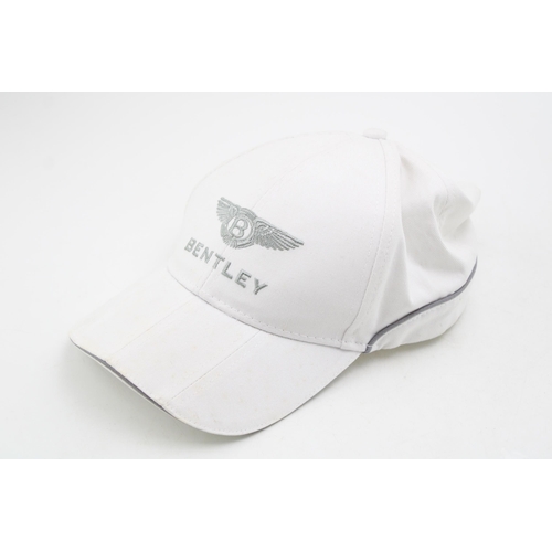 255 - A Bentley Motors official baseball cap. Cream cotton with embroidered Bentley logo.