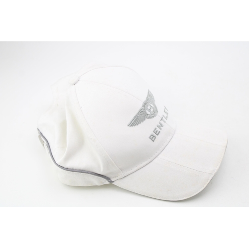 255 - A Bentley Motors official baseball cap. Cream cotton with embroidered Bentley logo.