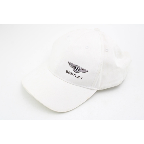 256 - A Bentley Motors official baseball cap. Cream cotton with metallic Bentley logo.