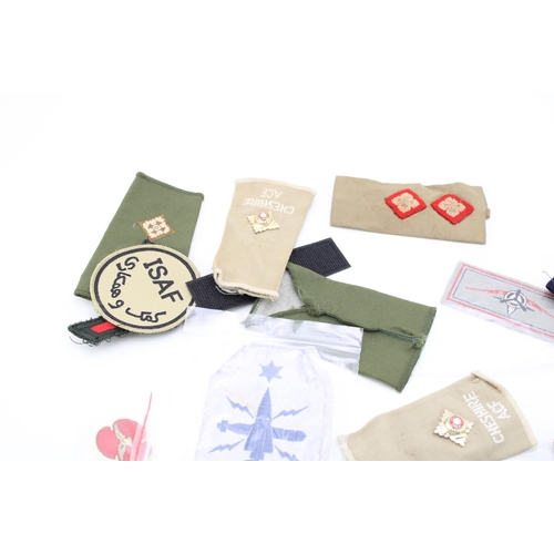 257 - A mixed collection of military cloth patches and badges to include Cheshire ACF, ISAF together with ... 