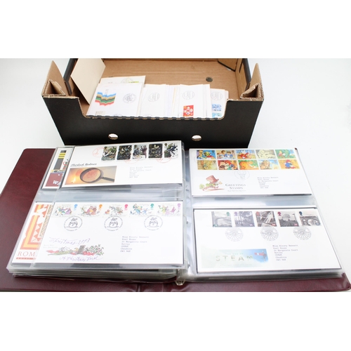 260 - A collection of Royal Mail First Day Covers in a ring binder together with a collection of Swiss Fir... 