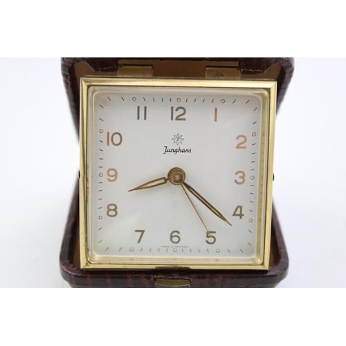 59 - Junghams 1974 German Folding mechanical travel alarm clock. Height 9cm.