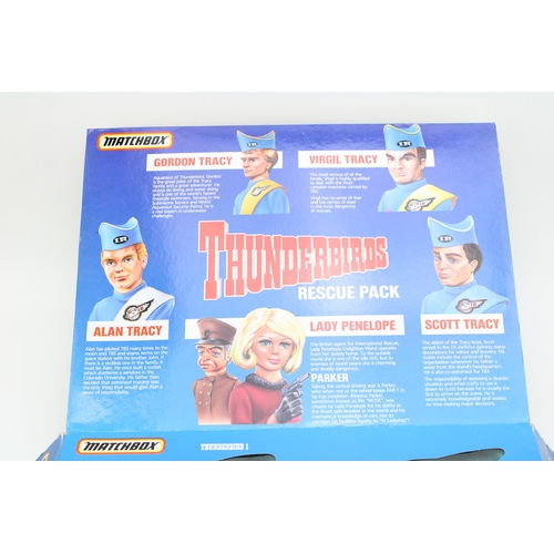 67 - A boxed Matchbox 'Thunderbirds Rescue Pack' c1992. To include TB1, TB2, TB3, TB4 and Lady Penelope's... 