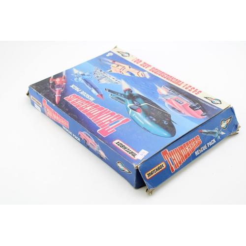 67 - A boxed Matchbox 'Thunderbirds Rescue Pack' c1992. To include TB1, TB2, TB3, TB4 and Lady Penelope's... 