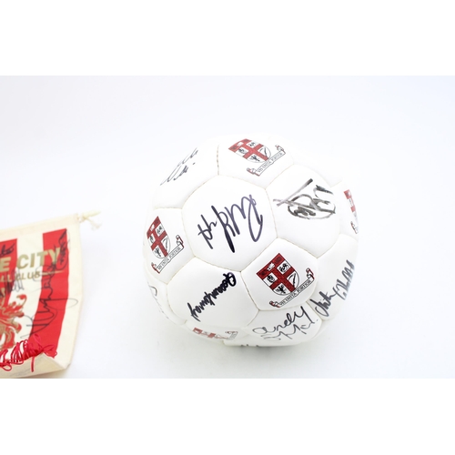 69 - A signed Stoke City Football Club ball and pennant c1989.