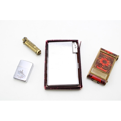 72 - A collection of smoking related items to include a cigarette case / lighter with map of Ireland / Ei... 