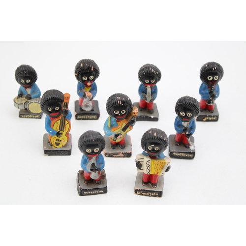 92 - A collection of original hand painted Robertson Jam collectables band members. Height 7cm. (9)