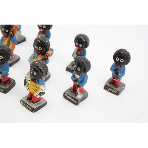 92 - A collection of original hand painted Robertson Jam collectables band members. Height 7cm. (9)