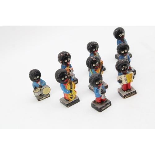 92 - A collection of original hand painted Robertson Jam collectables band members. Height 7cm. (9)