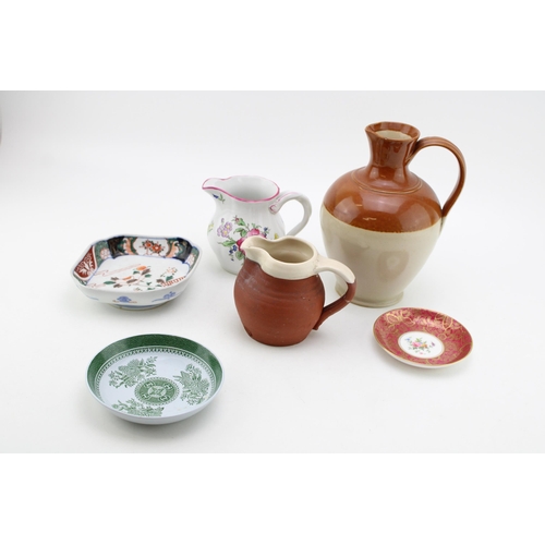 95 - A mixed collection of ceramics to include stoneware jugs, Oriental bowls and Copeland Spode jug. (Qt... 