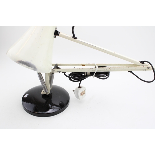 262 - A Terry's Anglepoise 90 desk lamp in white on black base. Height 50cm.