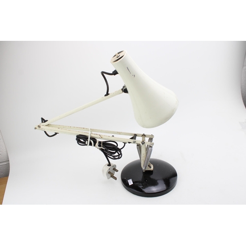 262 - A Terry's Anglepoise 90 desk lamp in white on black base. Height 50cm.