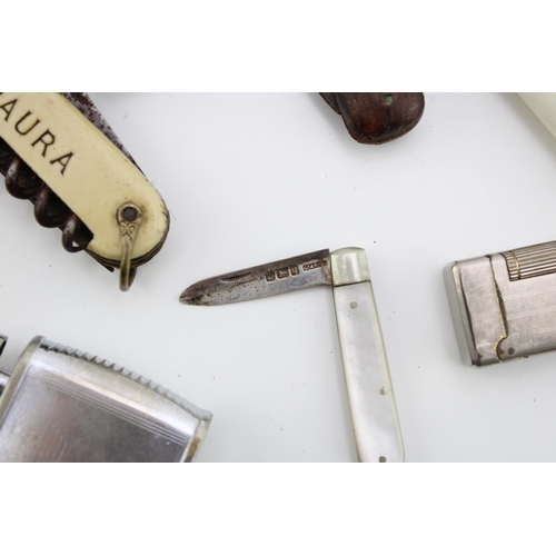 101 - A mixed collection of pocket knives, pen knives and vintage cigarette  lighters, of note Sheffield a... 