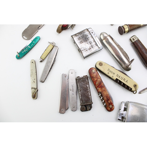 101 - A mixed collection of pocket knives, pen knives and vintage cigarette  lighters, of note Sheffield a... 