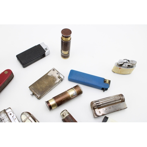 101 - A mixed collection of pocket knives, pen knives and vintage cigarette  lighters, of note Sheffield a... 