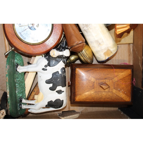 110 - A collection of household objects including two barometers, wooden objects, treen, a cow horn bottle... 