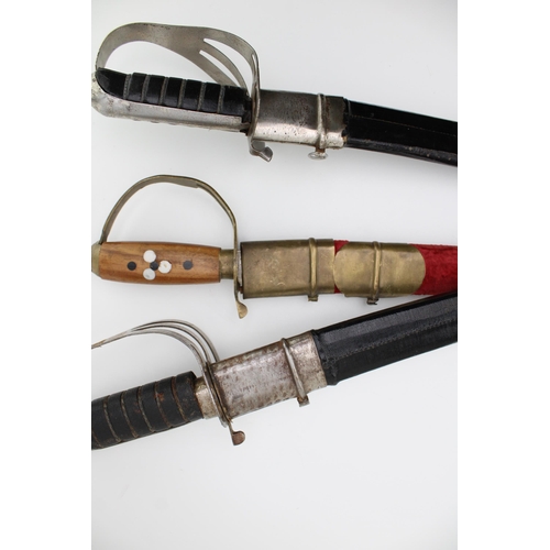 122 - Three reproduction swords in scabbards