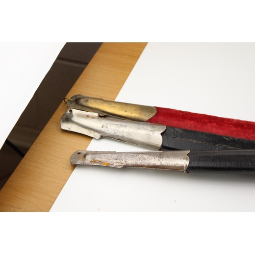 122 - Three reproduction swords in scabbards