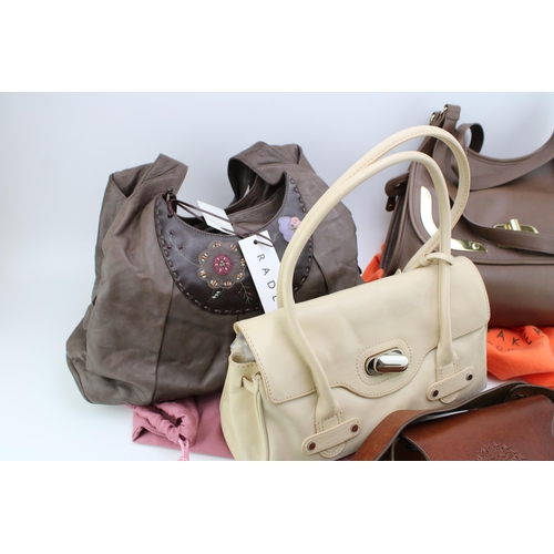 148 - A collection of modern hand bags to include Radley, Ted Baker, Jasper Conran etc