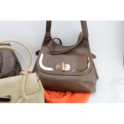 148 - A collection of modern hand bags to include Radley, Ted Baker, Jasper Conran etc