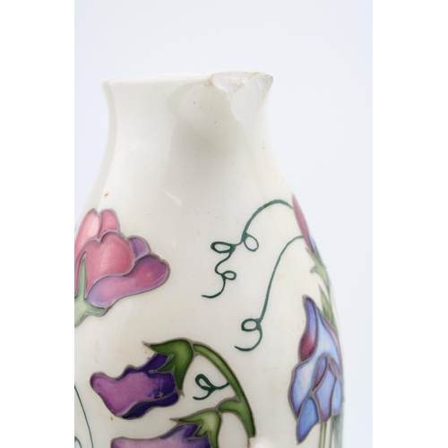 150 - Large Moorcroft jug with floral design, af, 27.5cm tall.