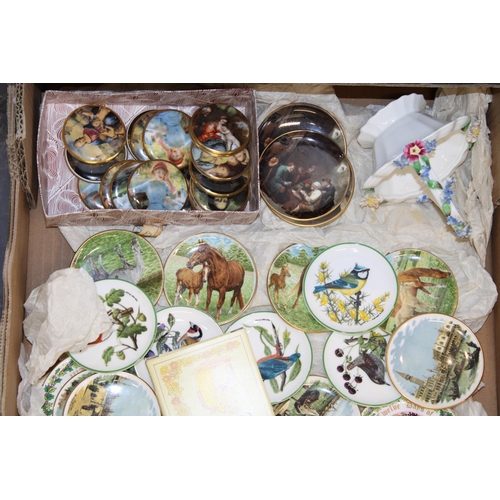 154 - A mixed collection of ceramics to include Crown Staffordshire plaques, birds, miniature plates and s... 