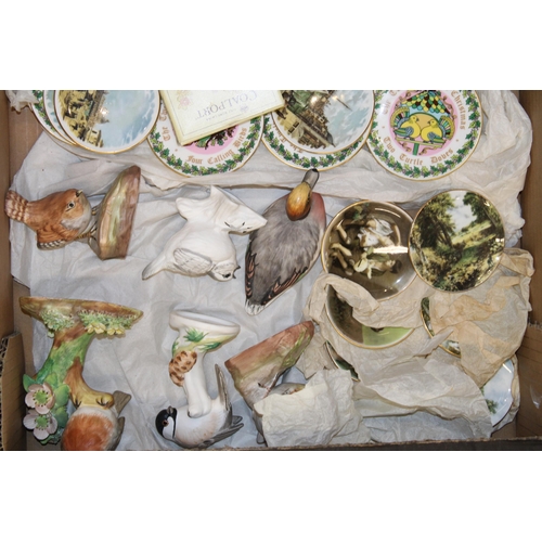 154 - A mixed collection of ceramics to include Crown Staffordshire plaques, birds, miniature plates and s... 