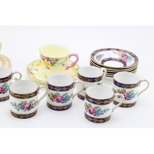 159 - A collection of Crown Staffordshire tea and coffee services (Qty).