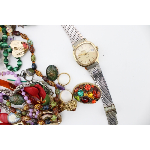 160 - A mixed collection of costume jewellery and a gentleman's Sekonda watch. (Qty)