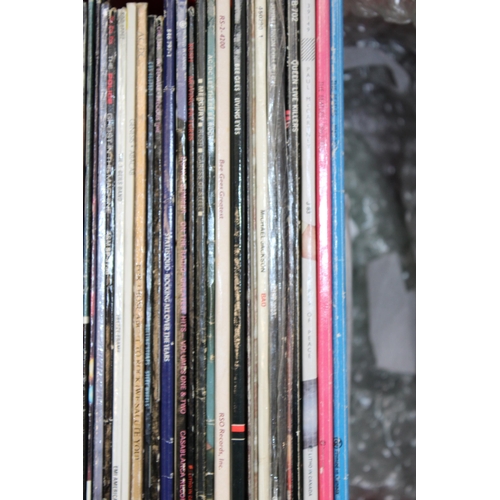 18 - A collection of vinyl LP singles together with 7