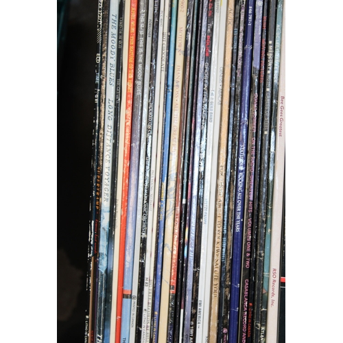 18 - A collection of vinyl LP singles together with 7