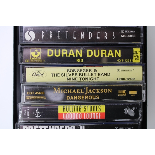 19 - A collection of albums on cassette to include Rolling Stones Voodoo Lounge, Prendenders and Prenders... 