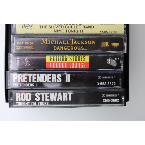 19 - A collection of albums on cassette to include Rolling Stones Voodoo Lounge, Prendenders and Prenders... 