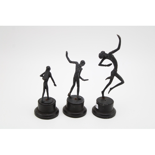 22 - A trio of vintage Art Deco style bronzed figures on bases. Height 21.5cm.