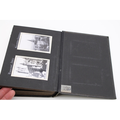 33 - A WWII era photograph album with photographs taken whilst cycle touring in the UK, including picture... 