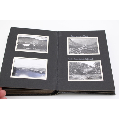 33 - A WWII era photograph album with photographs taken whilst cycle touring in the UK, including picture... 