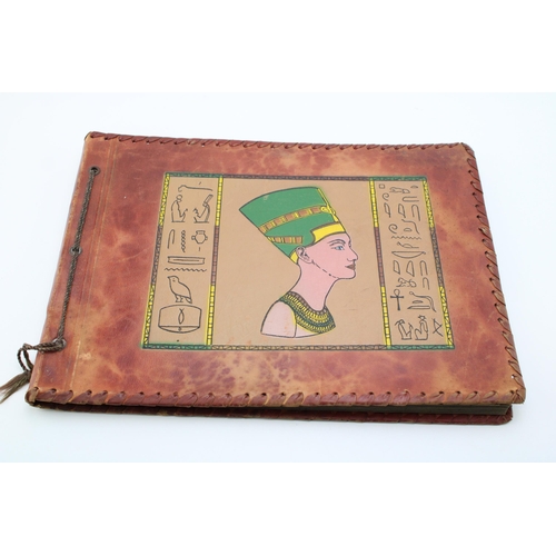 39 - A leather bound period photo album from North Africa containing an interesting collection of WWII er... 