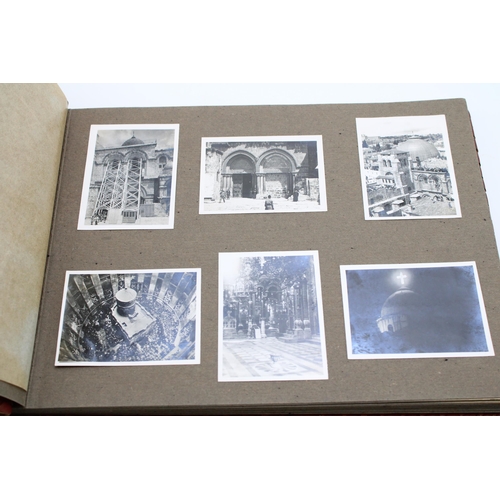 39 - A leather bound period photo album from North Africa containing an interesting collection of WWII er... 