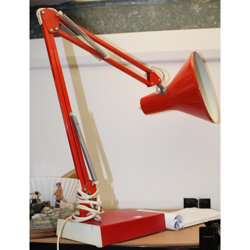 77 - A Terry's' style Anglepoise lamp in orange colour way, marked 'Made In Italy' on red base. Height 65... 