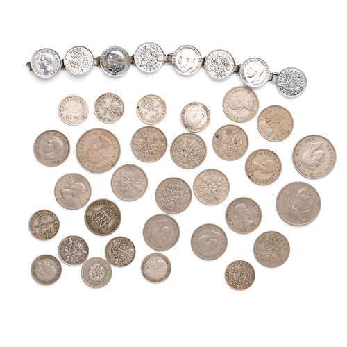 113 - A collection of silver and half silver coins to include silver 3d pieces (5.5g), half silver mixed U... 