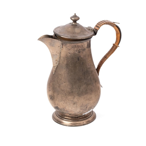 147 - A late Victorian silver hot water jug, hallmarked London 1897. Weight 554g