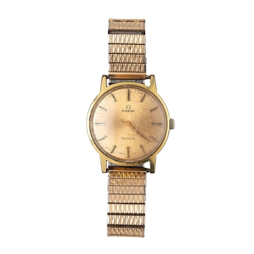 38 - A gentleman's vintage Omega wristwatch, the signed gold coloured dial with baton markers and minute ... 