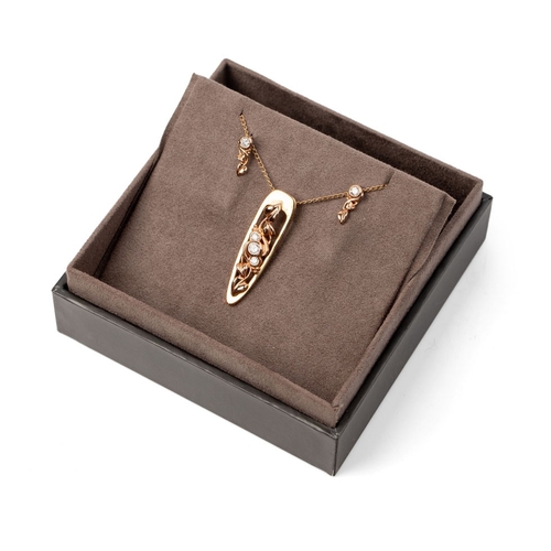 A Clogau Welsh 18ct gold and diamond suite of jewellery, comprising pendant, of open work ivy leaves, set with three diamonds, largest central stone of approximately 3.25mm, on 18ct gold chain, chain length 46cm, pendant and chain weight 10.0g, with a pair of matching earrings, each with single diamond set above trailing leaf drop, earrings weight 1.8g including 18ct gold butterfly backs, total weight 11.8g, with original Clogau box.